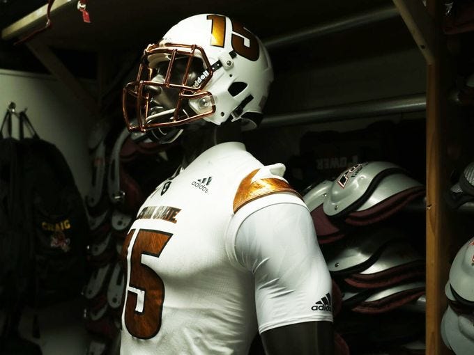 gold football uniforms